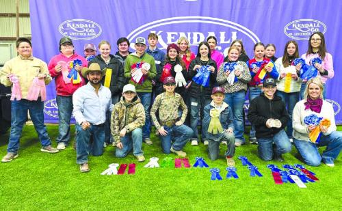 Pictured front from left: Coach JoJo Carrales, Crockett Guenther, Tate Fritsch, Joe Carrales, Hudson Holub, and Coach Kaci Carrales; middle row: Hunter Gabler, Rilan Karisch, Julia Melton, Holden Holub, Adalyn Carrales, Alexis Berckenhoff, Kaisley Janecka, Kinley Kutac, Addison Berckenhoff, and Tatum Fritsch; back row: Abraham McBride, Logan Poncik, Kinley Kutac, Hailey Janish, Tori Newton, Rheagan Karisch, and Brealey Nieto.