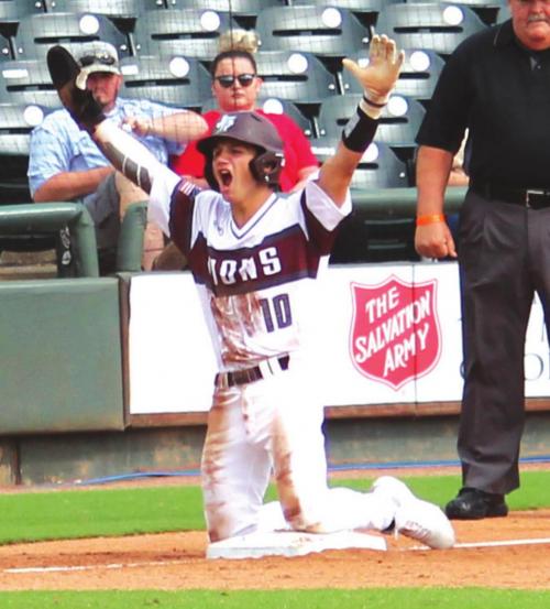 Travis Gully celebrates reaching third base in the second inning. He reached base all four times he came up to bat in the title game.