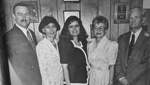 The Barton Family posed for this photo at the newspaper office several years ago – left to right , the late Dickie Barton and his wife Nonnie, current publisher Regina Keilers, and her parents, the late Nelda and Dick Barton.