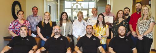 Pictured front from left: Frank Wolf (Navy, 9 years), Seth Dalton (Army, 4 years) Brandon Canik (Air Force 3 years, Texas Air National Guard 6 years), and Tyler Poli (Navy, 10 years, Reserves 8 years); back row: Megan Busa, Brian Hobart, Katherine Green, Michelle Hodge, George Nami, Jeremy Pietsch, Emilie Canik, Mike Mueller, Beth Martin, Andrew Swansey, Josh Werland and Carrie Hardy. Not pictured: Kaleb Bornefeld (Army, 4 years).