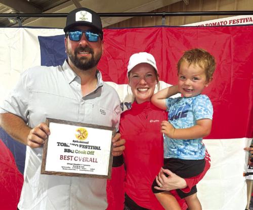 Brock, Valerie and Brant Otto with the Best Overall BBQ plaque.