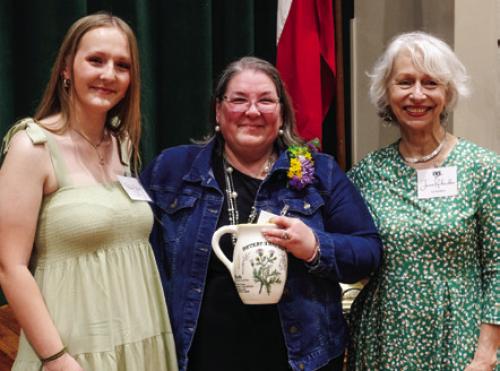 TWL presented an award to Christi Opiela for determination. Pictured are (from left) award presenter Olivia Weiser, Opiela and TWL chapter co-president Janis Richardson. Photos by Andy Behlen
