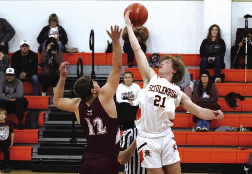 Schulenburg’s Kenny Schramek wins the opening tip-off in Tuesday’s game against Ganado. The Shorthorns won 68-51 to improve to 14-5 overall and 5-1 in district. Photo by Audrey Kristynik