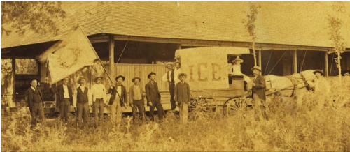 The Kreisches waving the Frisch Auf banner in front of the Schuetzen Verein pavilion. Heinrich Kreische is at the head of the horse and Henry Louis Kreische is holding the banner. Photo courtesy of Gavin Miculka, Kreische Brewery and Monument Hill State Historic Sites