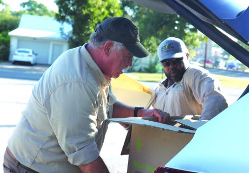 Fayette Electric Employees Larry Sulak and Macy Scott.