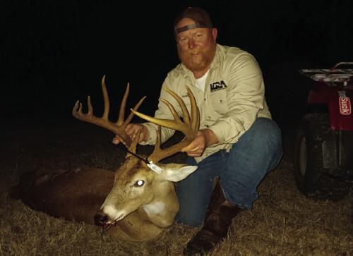 Josh Wagner of Schulenburg harvest a record-setting buck at his place near Moravia last Thursday.