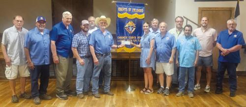 The La Grange Knights of Columbus Chromcik Council No. 2574 presented a $3,000 donation to the Turtle Wing Foundation. Accepting the donation is Destiny Siptak from Grand Knight Aaron Janda.