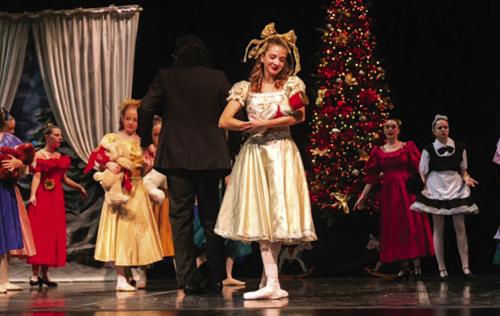 Lauren Hoffman, as Clara, dances with her nutcracker.