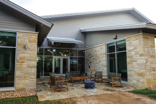 A campfire area tucked into the side of the retreat center