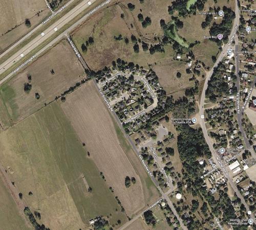 Pct. 1 Commissioner Jason McBroom wants the City of La Grange to take over maintenance of a section of Von Rosenberg Rd. that connects the Sunset Ridge Subdivision to the rest of the town. The yellow shaded line on the map indicates the approximate length of Von Rosenberg Rd. in question. Imagery from Google Maps