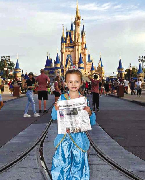 Reagan Arlund, Fayette County Little Miss, visited the Magic Kingdom Disney World over Thanksgiving break. She and her family took along The Fayette County Record.