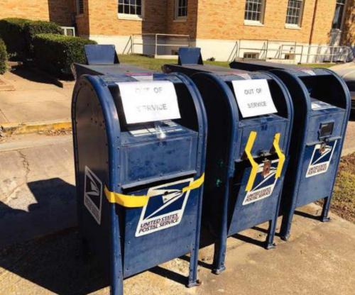 Two of the three drop-off mail boxes along Jefferson St at the La Grange post office were broken into this week. Photo by Bobby Bedient