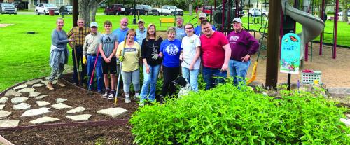 Lions Work On Butterfly Garden in LG