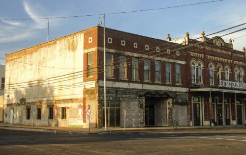 Pictured above is the current state of Schulenburg’s City Hall building in downtown. Below is a slide from the City’s design firm, PGAL, showing a rendering of what the exterior could look like if the renovation project proceeds.