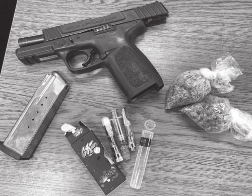 Man Arrested Here With Drugs and Gun