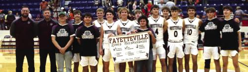 The Fayetteville Lions won a thrilling overtime contest Tuesday 80-74 over Wells in Madisonville to advance to the 1A basketball state quarterfinals for the third consecutive season. Lots more on the game on Page B1. Photo by Ken Sury