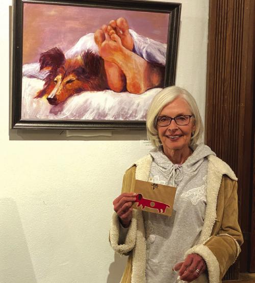 Karen Bookout earned first place in the Pet Portrait contest at the Live Oak Art Center in Columbus with her painting, “Friendly Bedfellows.”