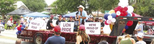 The members of the state championship Fayetteville baseball team had their own float (above) in Friday’s July 4 parade in Round Top. Some members of the team showed off their arms firing some long-distance candy tosses to the crowd.