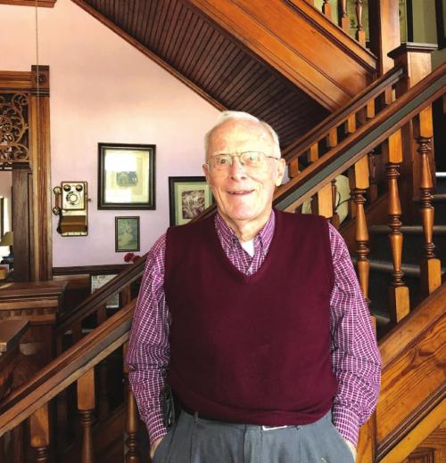 Arnold and Suzy Romberg, who acquired La Grange’s historic Kruschel House in 1979, saw past the structure’s peeling wallpaper, outdated plumbing and antiquated wiring. The couple admired the large, airy rooms and the artistry of the longleaf pine woodwork that dated back to the home’s construction in 1908. They appreciated the house’s partial basement, as well as the elevator that proved to be a Godsend many years later when Suzy’s health declined. Photo by Elaine Thomas