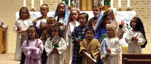 Sacred Heart Catholic School’s Pre-K 3 class portrayed saints at the All Saints Day Mass held November 1 as they honored all the saints in heaven.