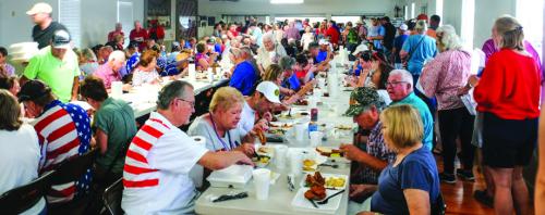 The packed church hall at St. John at last year’s festival on July 4. Photo by Andy Behlen