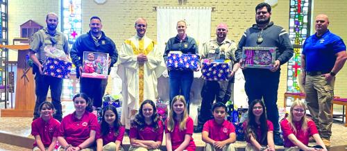 Sacred Heart Catholic School students and families prepare for the coming of the birth of Jesus, they show service to others and love of neighbor by giving gifts to others in celebration of Jesus’s birthday. Thanks to our families and staff for donating toys for the Fayette County Sheriff Department’s Deputy Santa program.
