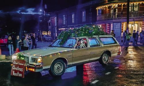 Fayetteville didn’t let a little rain ruin their Country Christmas celebration on the town square Saturday, which included a lively lighted parade. Dustin Canik threw a Christmas Tree on top of an old station wagon he decorated in a great depiction of the opening scene of National Lampoon’s Christmas Vacation movie. More photos of the Fayetteville fun in Friday’s edition. Photo by Rachel Kozel