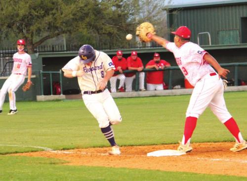 La Grange’s Ryder Imhoff dodges a throw as he runs to first Friday. He was safe. Photos by Jeff Wick
