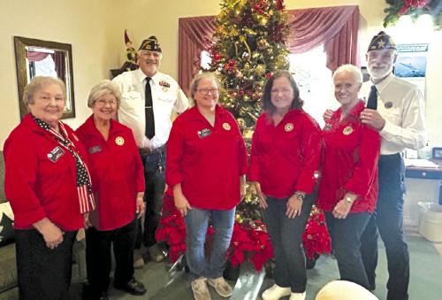 American Legion Auxiliary came to recognize all of our veterans and the spouses of veterans. They spent time telling stories, singing songs and ended the visit with handing out goodie bags loaded with holiday treats. Pictured left to right: Gladys Polasek, Secretary/ Treasurer Stacy Ryza, Commander Richard Gray, Vice President Phyllis Chavarria, Elaine Matthys, President Mary Battle, and Service Officer John Battle.