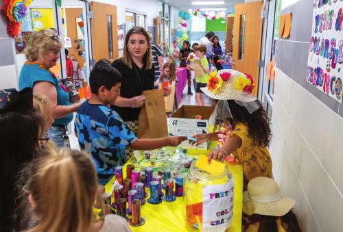 The second grade hallway at La Grange Elementary School seemed as busy as the floor of the New York Stock Exchange Tuesday afternoon during the Second Grade Market Day.