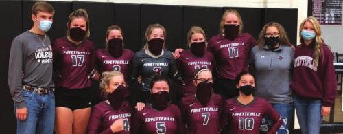 The members of the Fayetteville volleyball team pose after Tuesday’s regional semifinal win.