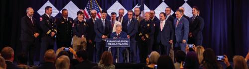 Fayette County EMS Director Josh Vandever was on hand when Governor Greg Abbott signed two important healthcare bills into law last Tuesday, Sept. 9. Vandever is pictured third from the left. To his left is Michael Furrh, the EMS Director for Lavaca and Colorado counties.