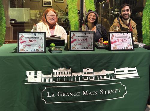 Left to right, Ashley Watkins (the City’s Tourism and Communications Coordinator) Diana Huery, (Main Street and Tourism Assistant) and Caleb Parks (La Grange Main Street Manager), during one of Main Street’s signature events here, Schmeckenfest.