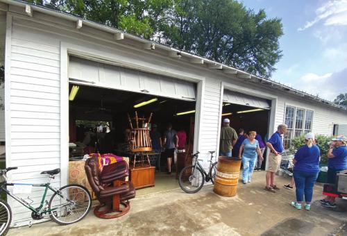 The Lions Club members have filled the Old Fire Station on the Square with many interesting bargains being sold to sponsor local scholarships