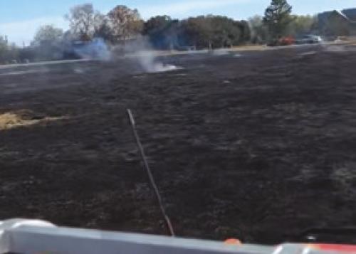 The scene from the back of a fire truck shows the extent of the grass fire. Photo courtesy of the Carmine Volunteer Fire Department