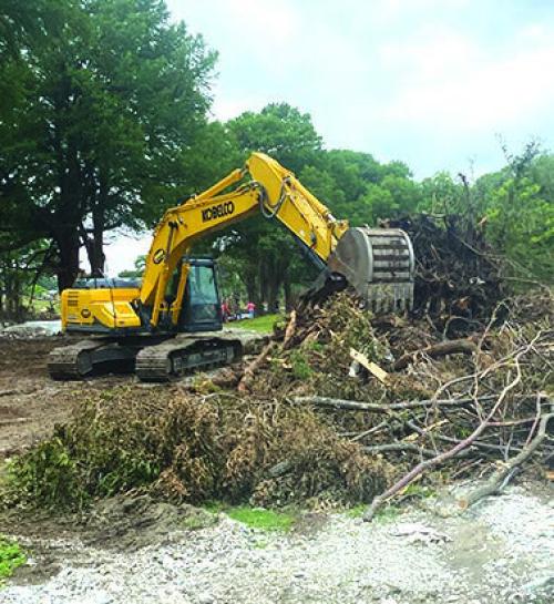 Joe Rogers Dozer Service of La Grange sent a crew of heavy equipment and operators to Camp La Junta in Kerr County last week to help cleanup the campground following the devastating July 4 flood. Photos courtesy of Joe Rogers