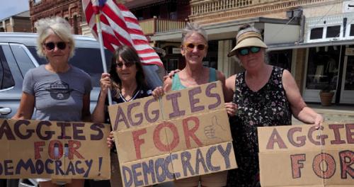 “Aggies for democracy rallied on the La Grange Square on Sunday. The next rally changes from Sunday to Saturday, May 24, and the new time is 10 am. What has not changed is the place, southwest corner of the La Grange Square. All patriotic Americans for democracy are welcome.” Photo Courtesy of Virginia Leech