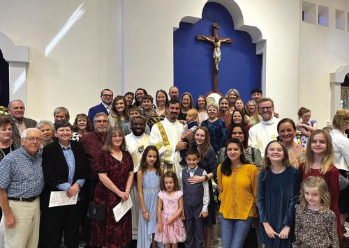 Some of the estimated 100 members of Sacred Heart Catholic Church and School who traveled to Austin to witness Deacon Kyle’s ordination.
