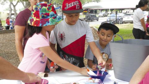 Local children enjoy Art in Schulenburg’s Wolters Park on May 6.