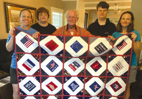 Dan Tajchman of La Grange was presented a Quilt of Valor by his wife Marian. Dan served as E5 US Army Intelligence from 1969-1972. He is surrounded by his daughters and grandsons. Marian is a member of the Colorado Valley Quilt Guild who made the quilt.