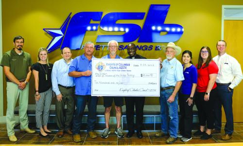 KC Donates to Holy Rosary Rebuilding Fund