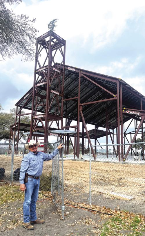 Miguel Rios opened the gate for us to tour the construction site of the new Hostyn church. Photo by Jeff Wick