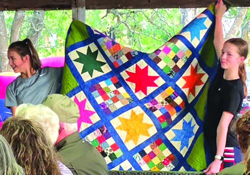 St. Paul Lutheran quilt fetched over $300 at the recent auction held by the Sons of Hermann.