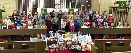 Mt. Calvary Lutheran Church and Preschool teamed up to collect non-perishable food for the Amen Food Pantry. The kids and their donations are shown above.