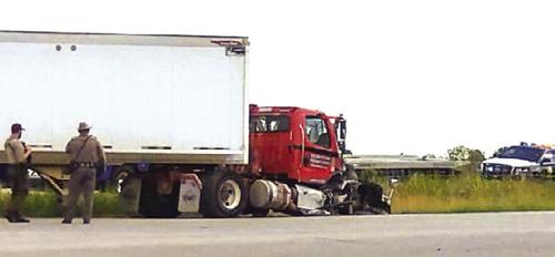 Part of the wreckage from Friday’s accident where an 18-wheeler and a car collided near the Fayette/Bastrop County line.