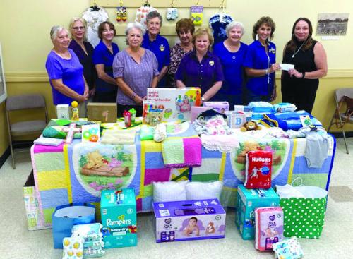 Hostyn Catholic Daughters Make a Donation to the Family Crisis Center