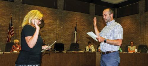 La Grange City Secretary Janet Bayer (left) administered the oath of office to new Ward 4 Councilman Bryan Kerr at the La Grange City Council meeting on Monday, June 26. Photo by Andy Behlen