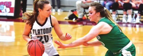 Ali Janecka works around the Bloomington defense to score for the Flatonia Lady Bulldogs in their win Tuesday. Photo by Stephanie Steinhauser