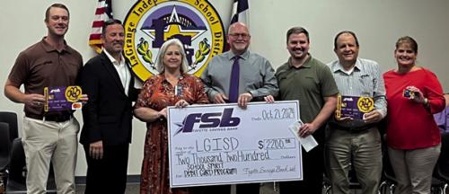 Pictured here are Fayette Savings Bank President - Wade Mozisek, La Grange ISD Superintendent – Andy McHazlett, LGISD Director of Finance – Diana Fitzpatrick, LGISD School Board President – Gary Drab, Fayette Savings Loan Officer Dillon Drab, CFO – Rodney Kalich, and Vice-President Deposit Services - Darlene Brothers. Photo by Regina Keilers