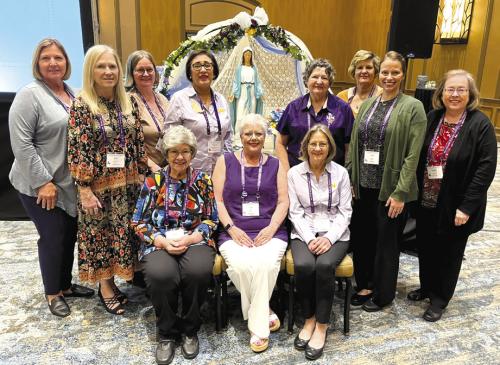 Court Annunciation No. 1962 members at the Marian Shrine during the State Convention, from left, seated, Stacy Ryza, Sherry Hebert, Shirley Antosh, and standing, Peggy Sulik, Rebecca Munsch, Kathy Weishuhn, Mary Lou Anderle, Elaine Bodine, Judy Evanicky, Aimee Krause, and Elizabeth Kallus.